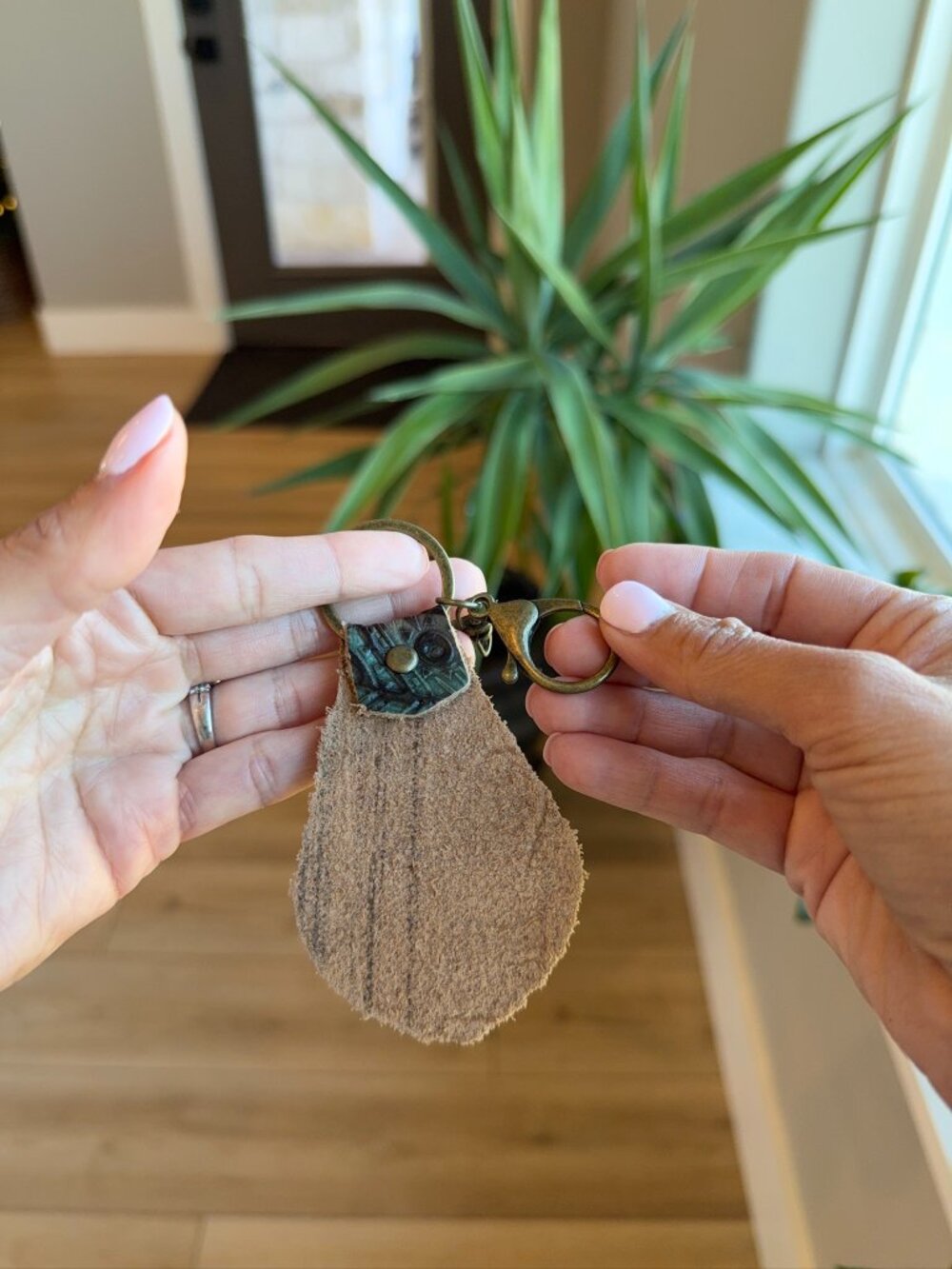 π 2/$20 Embossed Leather Bundle - 2 Keychains and Earrings - Picture 8 of 9